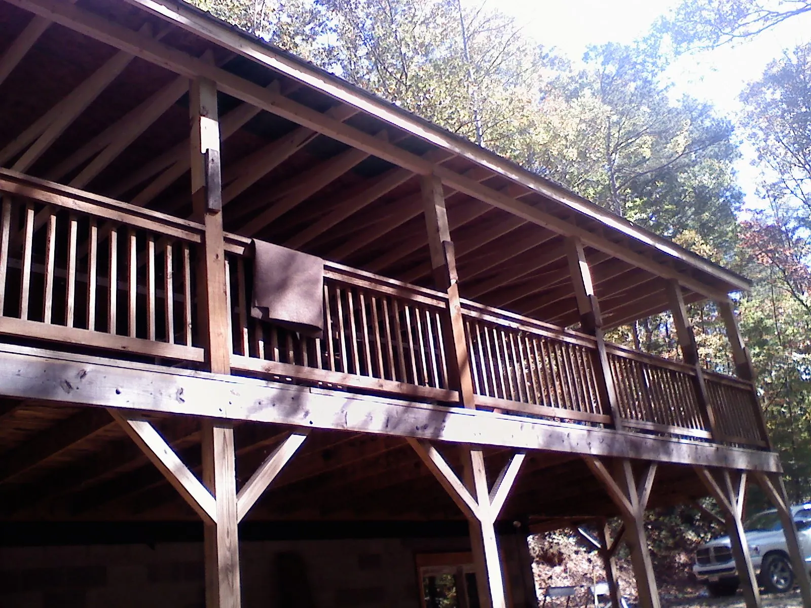 Timber framing under a new elevated porch and deck — Roof Leak Repair in Freeland by Roofing Brothers